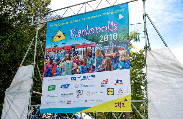 Banner für Stja e.V. Karlsruhe, Kinderspielstadt »Karlopolis« 